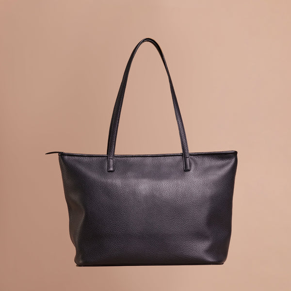Black handcrafted full grain leather  tote bag with YKK zipper and internal leather lining. 