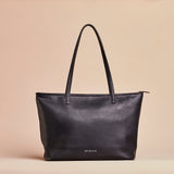 Black handcrafted full grain leather  tote bag with YKK zipper and internal leather lining. 