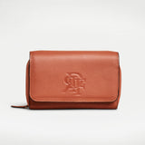 Tan brown caramel camel full grain italian leather wallet crossbody with silver zipper, embossed rey de flor logo, and full leather strap.