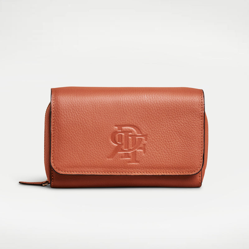 Tan brown caramel camel full grain italian leather wallet crossbody with silver zipper, embossed rey de flor logo, and full leather strap.