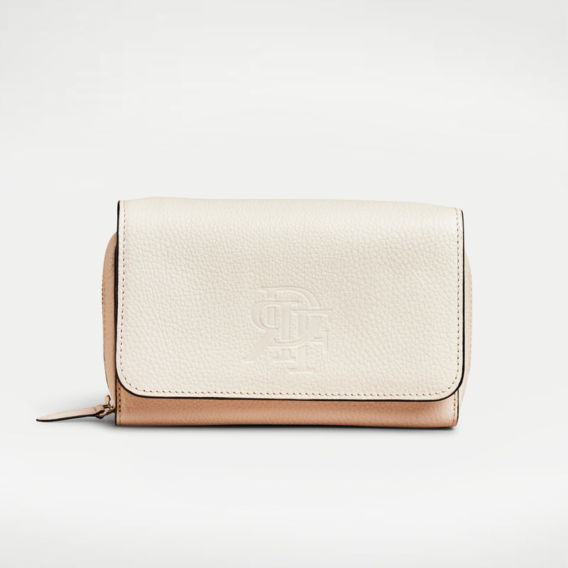 Cream full grain italian leather wallet crossbody with silver zipper, embossed rey de flor logo, and full leather strap.